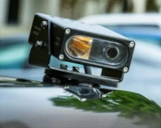 A plate-recognition camera mounted on a patrol vehicle